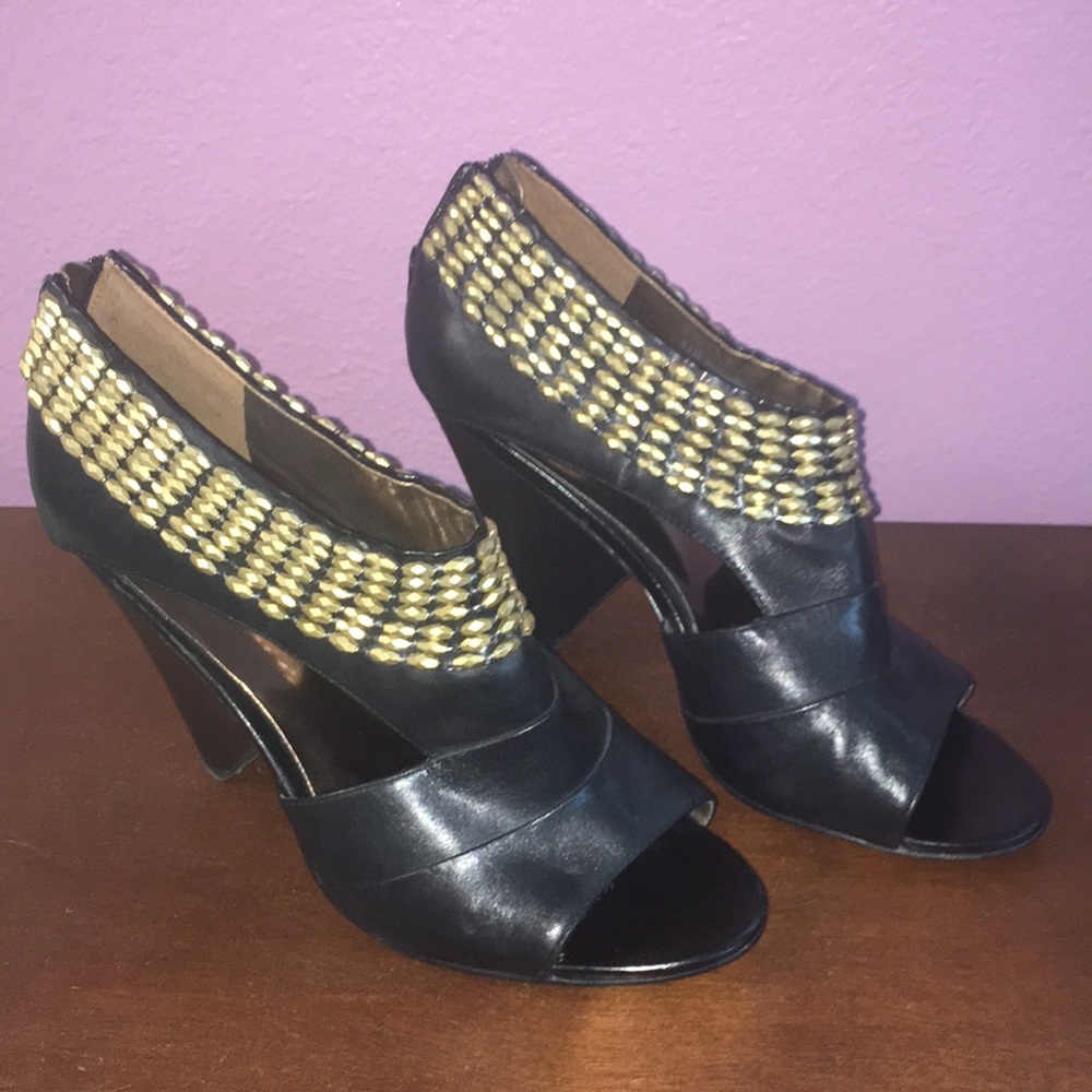 Carlos Santana black cutout booties